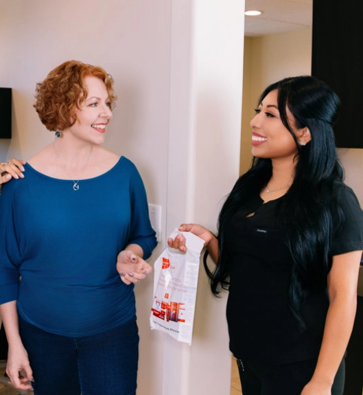 smiling woman with veneers